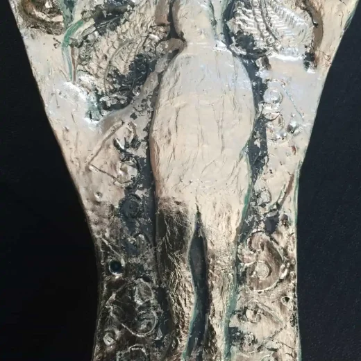 Detail of silver leaf ceramic arm